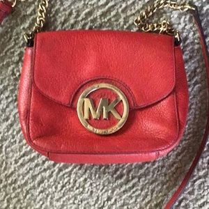 Red Michael Kors crossbody bag